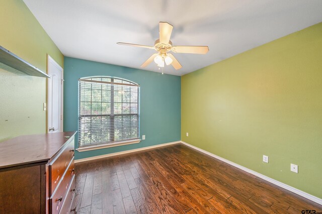10820 Cactus Trl, Flint, TX 75762 - empty room with dark wood-style flooring and ceiling fan