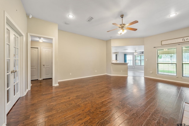 10820 Cactus Trl, Flint, TX 75762 - unfurnished living room featuring ceiling fan, dark wood-style flooring, recessed lighting, and french doors