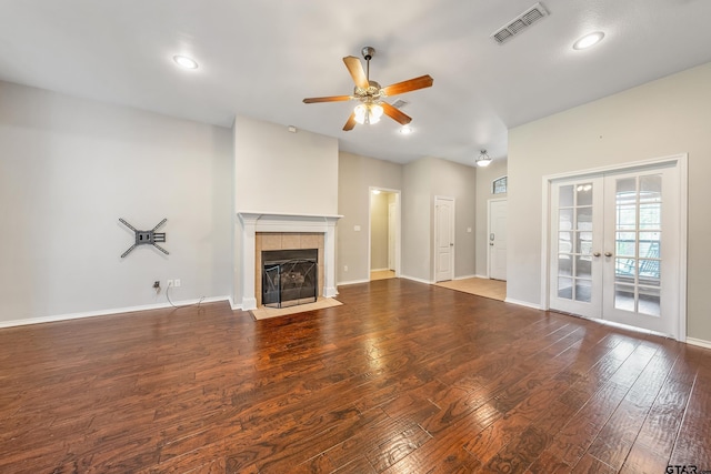 10820 Cactus Trl, Flint, TX 75762 - unfurnished living room with ceiling fan, hardwood / wood-style flooring, french doors, a fireplace, and recessed lighting
