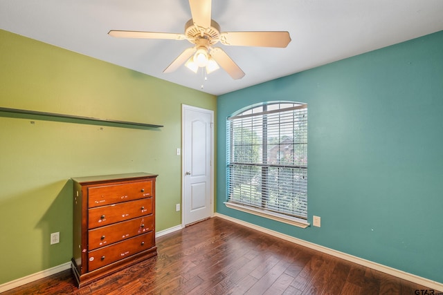 10820 Cactus Trl, Flint, TX 75762 - unfurnished bedroom featuring dark wood-type flooring and ceiling fan