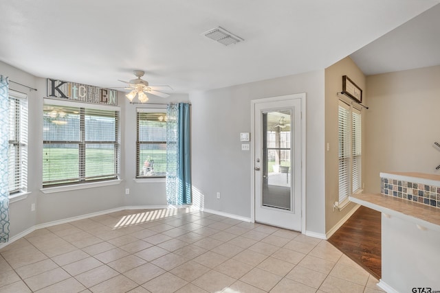 10820 Cactus Trl, Flint, TX 75762 - foyer with light tile patterned flooring and ceiling fan