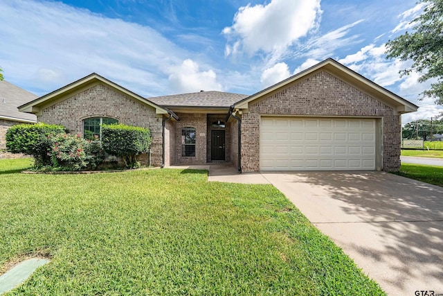 10820 Cactus Trl, Flint, TX 75762 - ranch-style home with brick siding, driveway, a front yard, and a garage