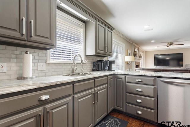 kitchen with stainless steel dishwasher, ceiling fan, and gray cabinets