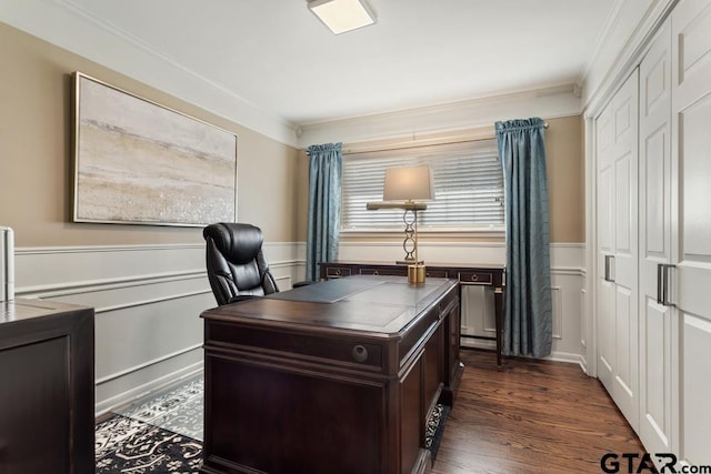 office area with dark hardwood / wood-style flooring and crown molding