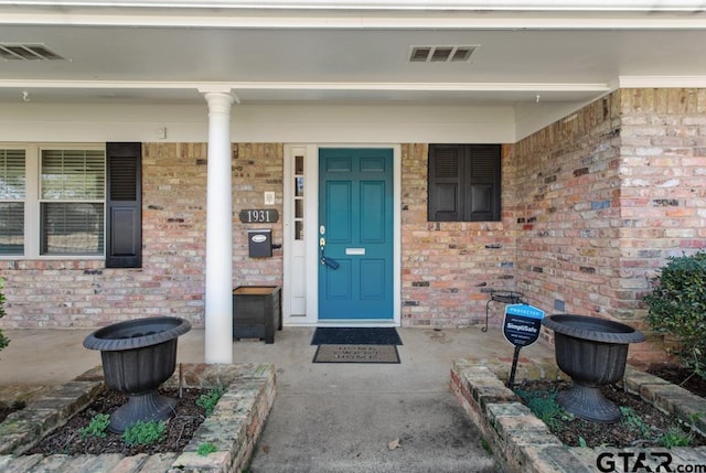 property entrance with a porch