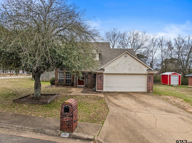 view of front facade featuring a garage, brick siding, driveway, and a front lawn