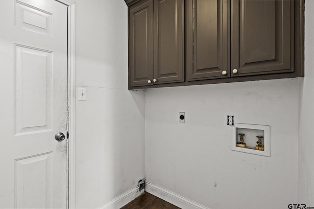 laundry area with washer hookup, cabinet space, dark wood-type flooring, electric dryer hookup, and baseboards