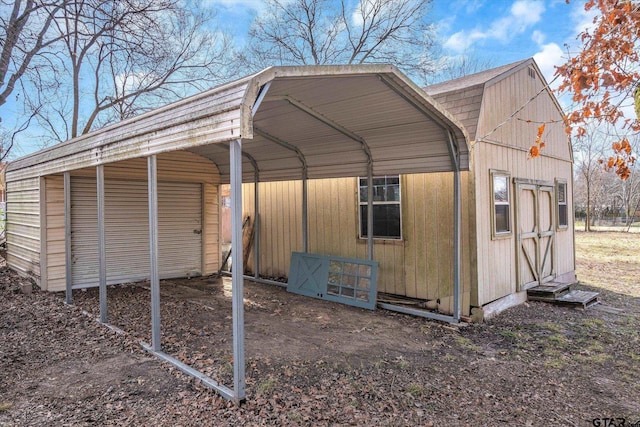 view of outdoor structure with a carport