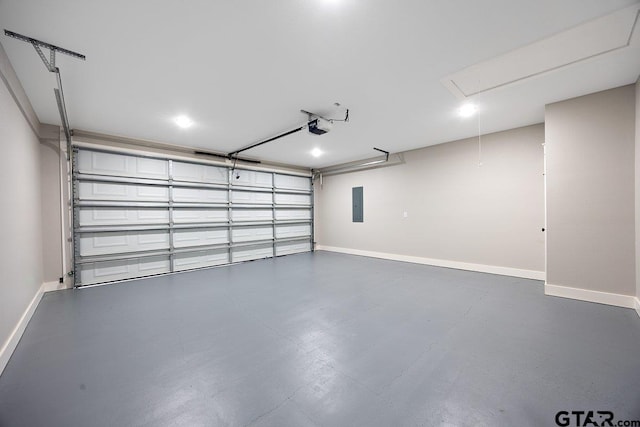 garage featuring a garage door opener and electric panel