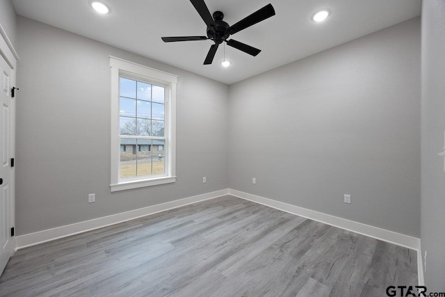 unfurnished room with light hardwood / wood-style floors and ceiling fan