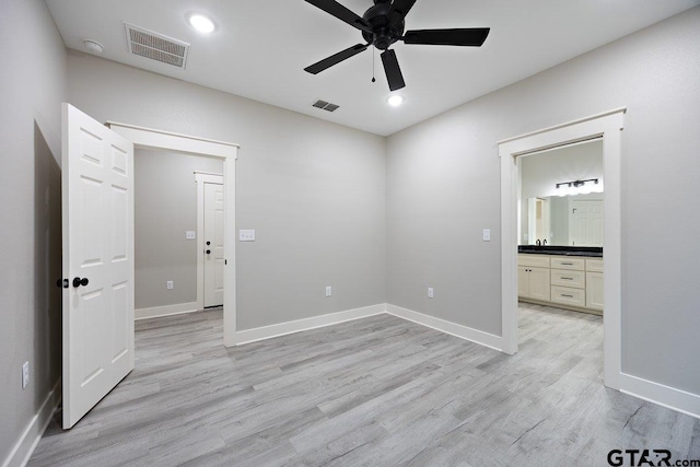 unfurnished bedroom featuring ceiling fan, connected bathroom, and light hardwood / wood-style floors