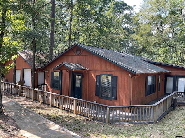 view of property exterior with a garage