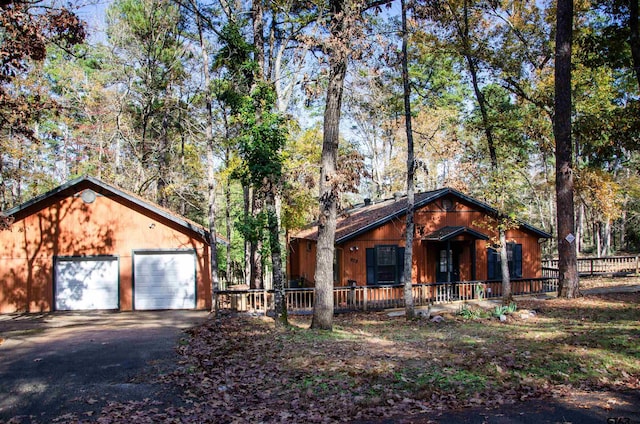 view of front of property with a garage and a porch