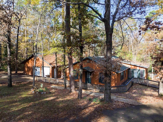 view of front of home with a garage and covered porch