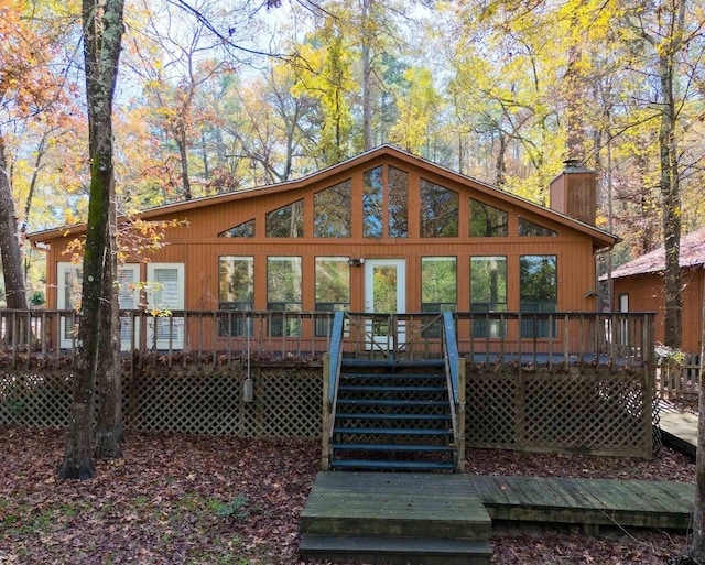 rear view of property with a deck