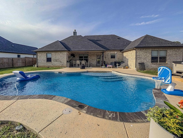 view of pool featuring fence, a patio area, and a fenced in pool