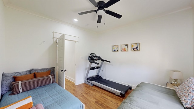 bedroom featuring ornamental molding, baseboards, recessed lighting, a ceiling fan, and light wood finished floors