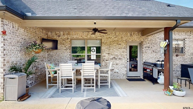 view of patio featuring a ceiling fan and outdoor dining space
