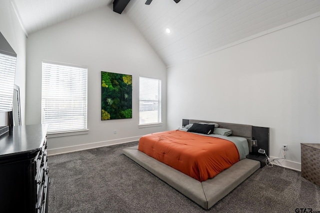 carpeted bedroom featuring ceiling fan, beamed ceiling, multiple windows, and high vaulted ceiling