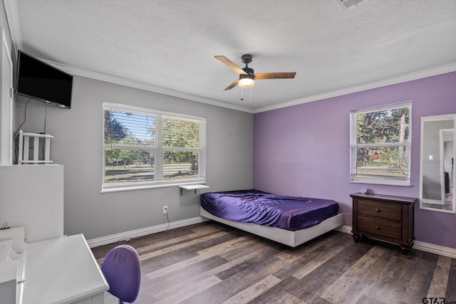 bedroom with multiple windows, ceiling fan, and dark hardwood / wood-style floors