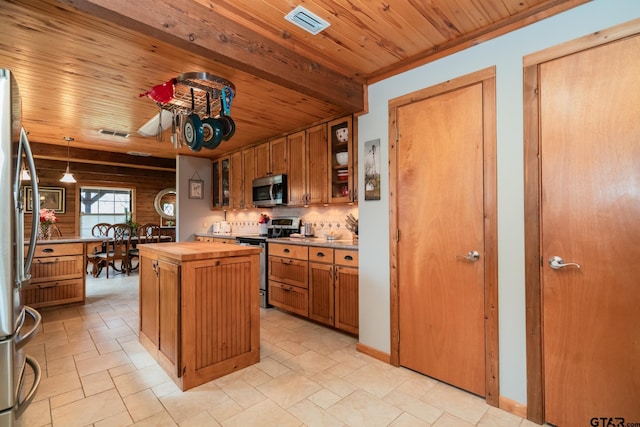 kitchen with appliances with stainless steel finishes, a center island, wooden ceiling, and decorative light fixtures