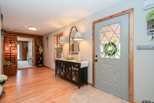 entrance foyer featuring light hardwood / wood-style floors