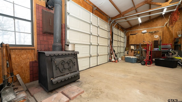 garage featuring a wood stove