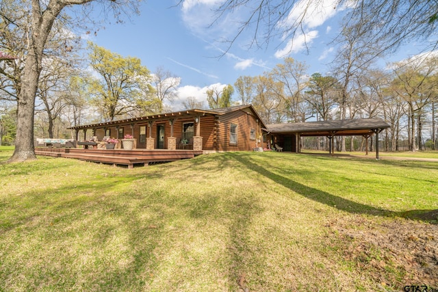 exterior space featuring a deck and a front lawn