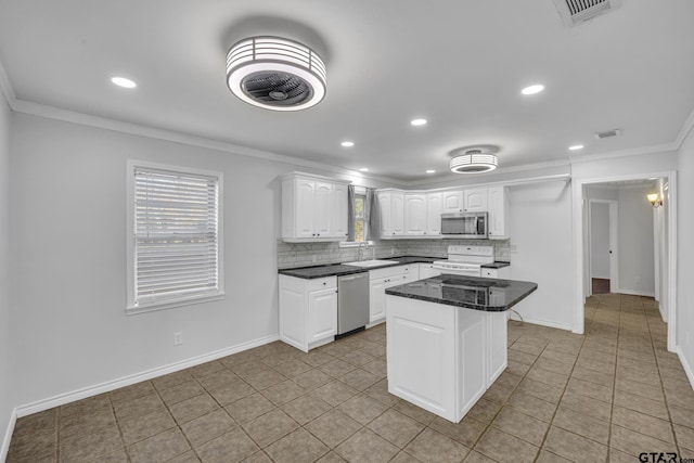 kitchen with white cabinetry, sink, stainless steel appliances, tasteful backsplash, and ornamental molding