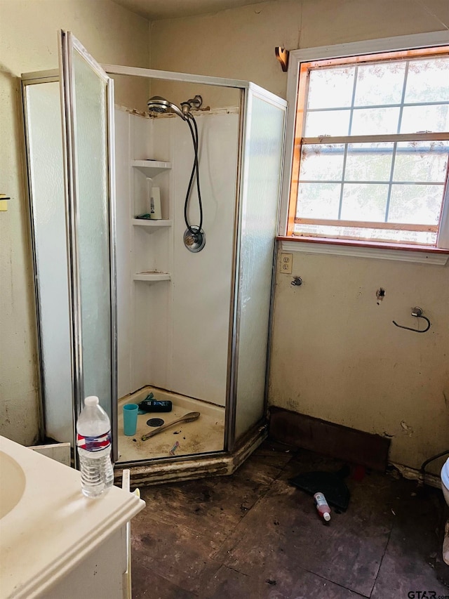 bathroom with an enclosed shower