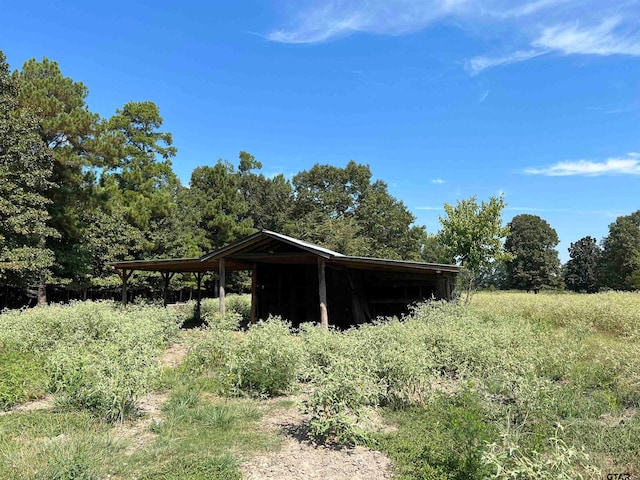 exterior space with a rural view