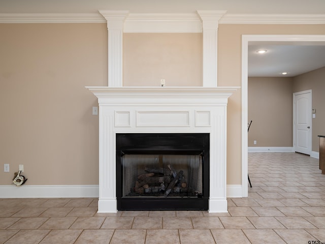 interior details featuring ornamental molding, baseboards, and a fireplace