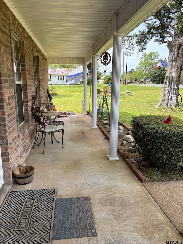 view of patio featuring a porch