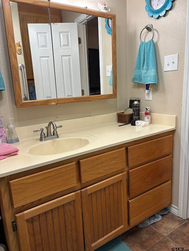 bathroom featuring vanity and tile patterned floors