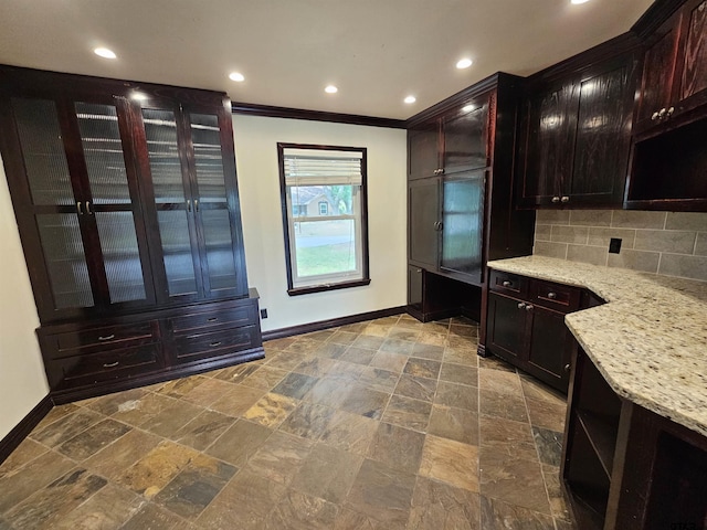 236 La Jolla Dr, Athens, TX 75751 - kitchen featuring baseboards, backsplash, light stone countertops, ornamental molding, and recessed lighting