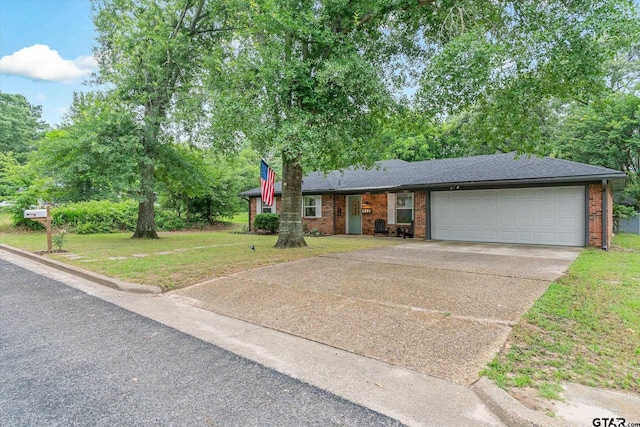 1004 Bunny Rabbit Rd, Athens, TX 75751 - view of front of house with an attached garage, driveway, brick siding, a front lawn, and a shingled roof