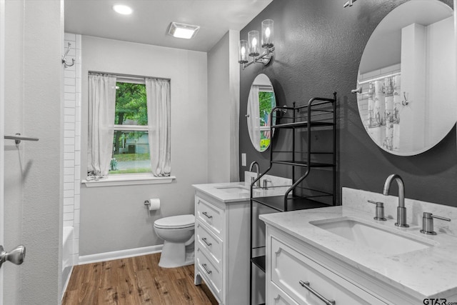 1004 Bunny Rabbit Rd, Athens, TX 75751 - bathroom featuring vanity, wood finished floors, and plenty of natural light