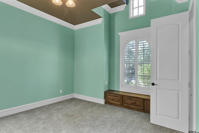 6805 Castle Pines Ct, Tyler, TX 75703 - unfurnished room with carpet flooring, crown molding, and baseboards