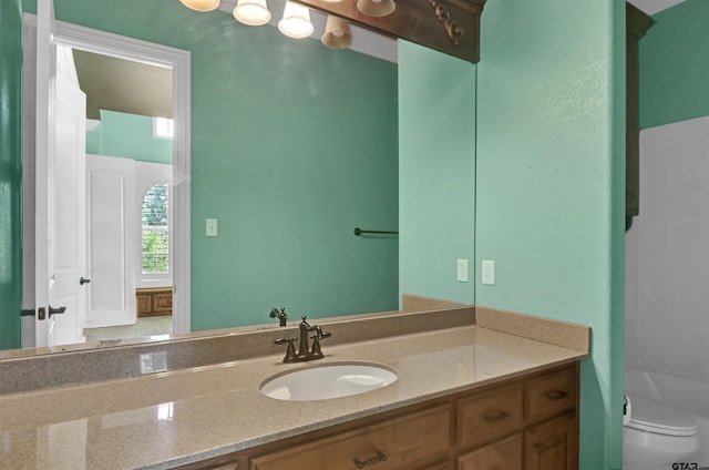 6805 Castle Pines Ct, Tyler, TX 75703 - bathroom featuring toilet and vanity