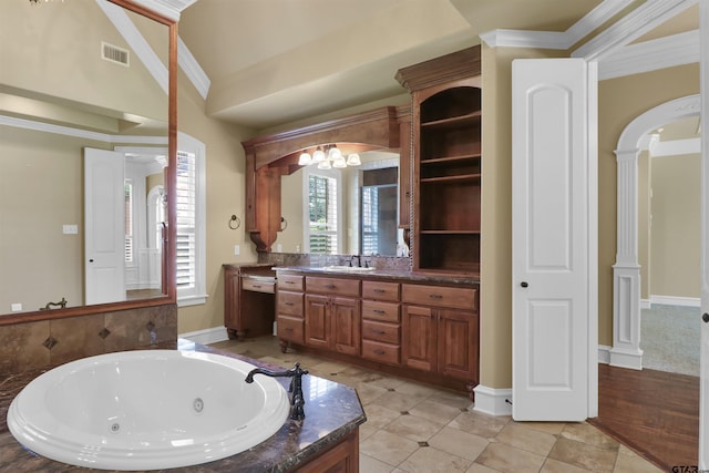 6805 Castle Pines Ct, Tyler, TX 75703 - full bathroom featuring a jetted tub, vanity, crown molding, tile patterned flooring, and a chandelier
