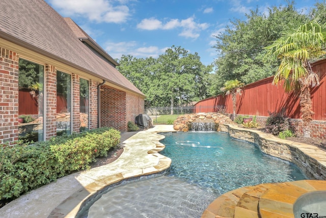6805 Castle Pines Ct, Tyler, TX 75703 - view of swimming pool featuring a fenced backyard
