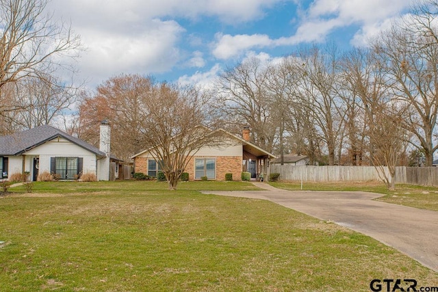 view of front facade with a front lawn