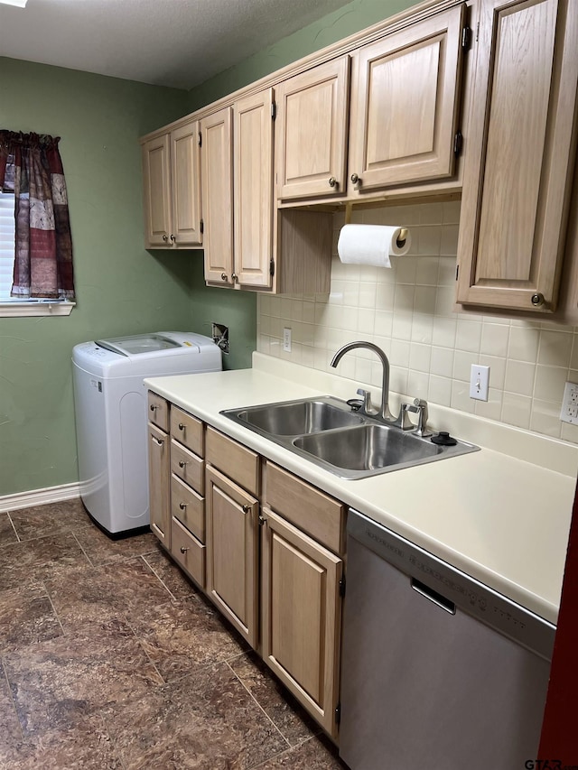 kitchen featuring washer and dryer, dishwasher, sink, backsplash, and light brown cabinets