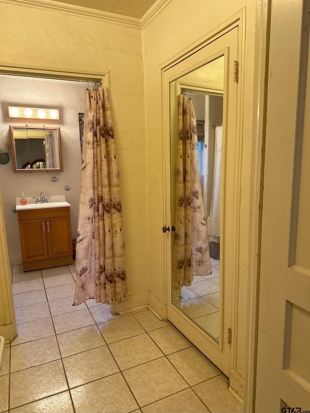 bathroom featuring vanity and tile patterned floors