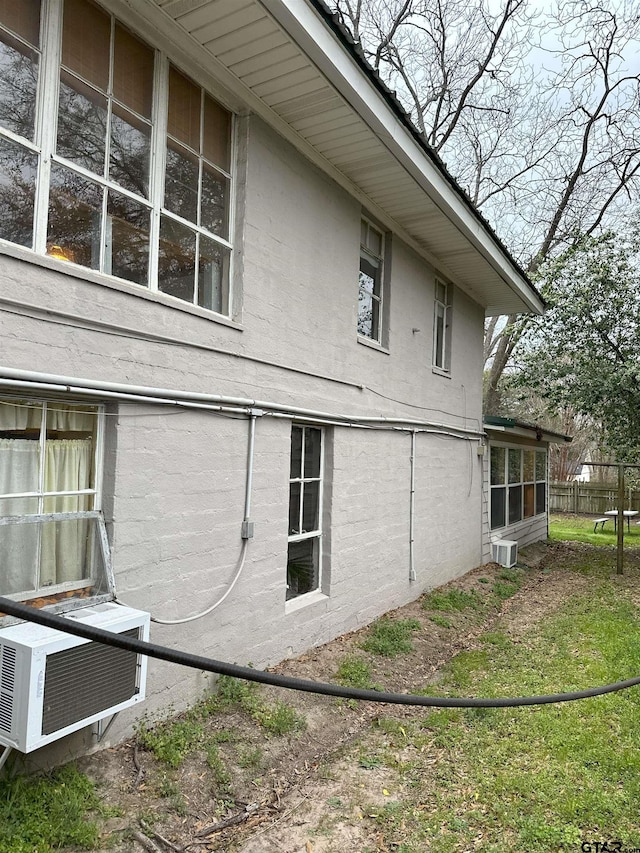 view of property exterior with cooling unit