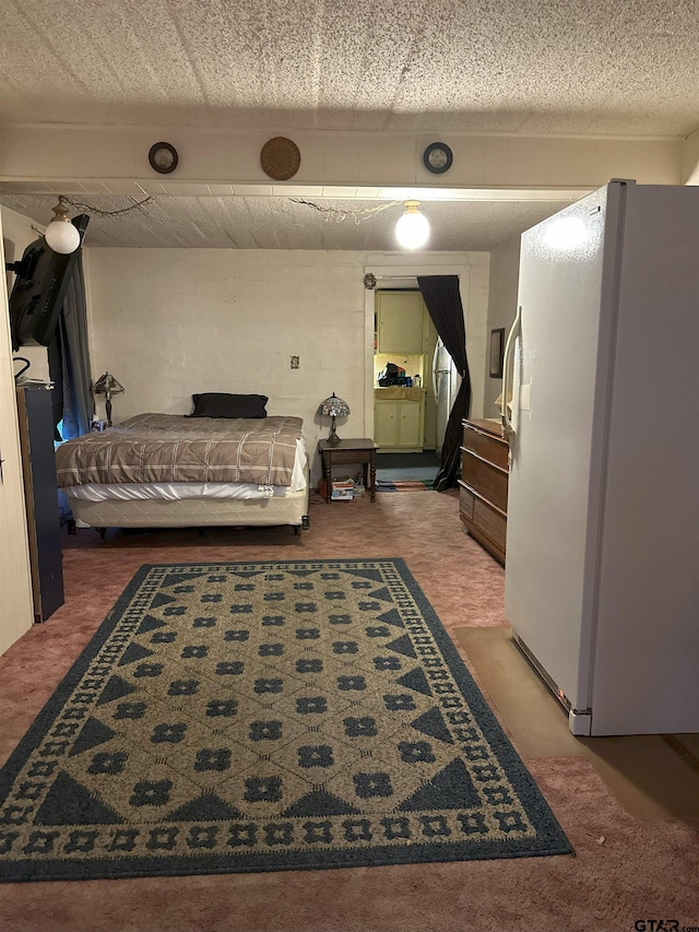 bedroom featuring carpet floors and white fridge