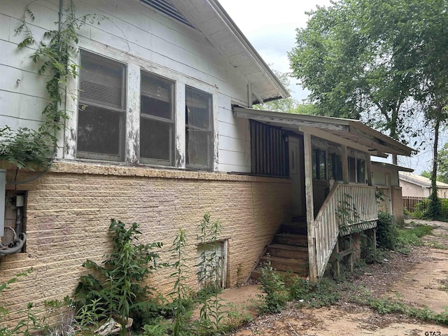 524 E San Antonio St, Alto, TX 75925 - view of side of property featuring stairway