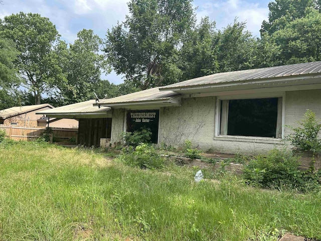 524 E San Antonio St, Alto, TX 75925 - view of property exterior featuring metal roof