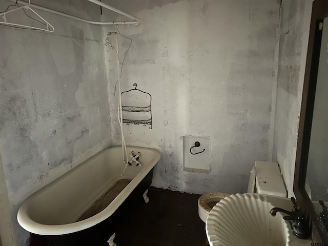524 E San Antonio St, Alto, TX 75925 - bathroom featuring a tub, toilet, and a shower