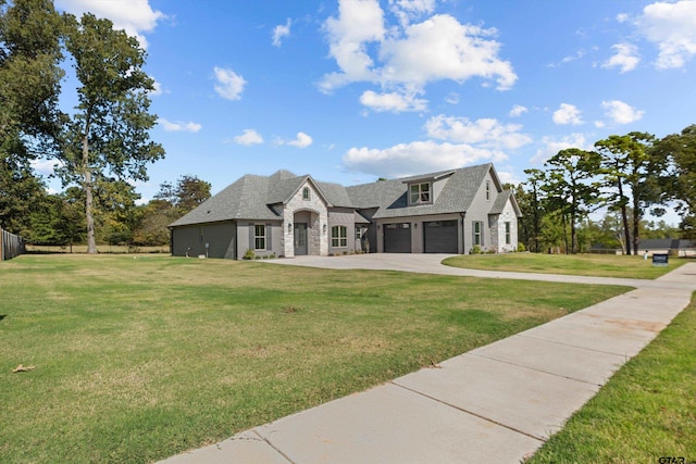 french country home featuring a front lawn